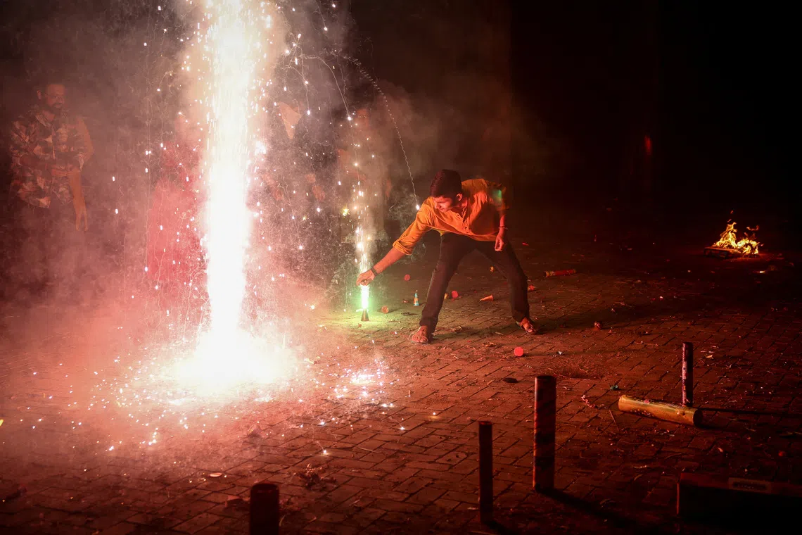 During Diwali, widespread bursting of firecrackers adds to the already high pollution levels in Delhi.
