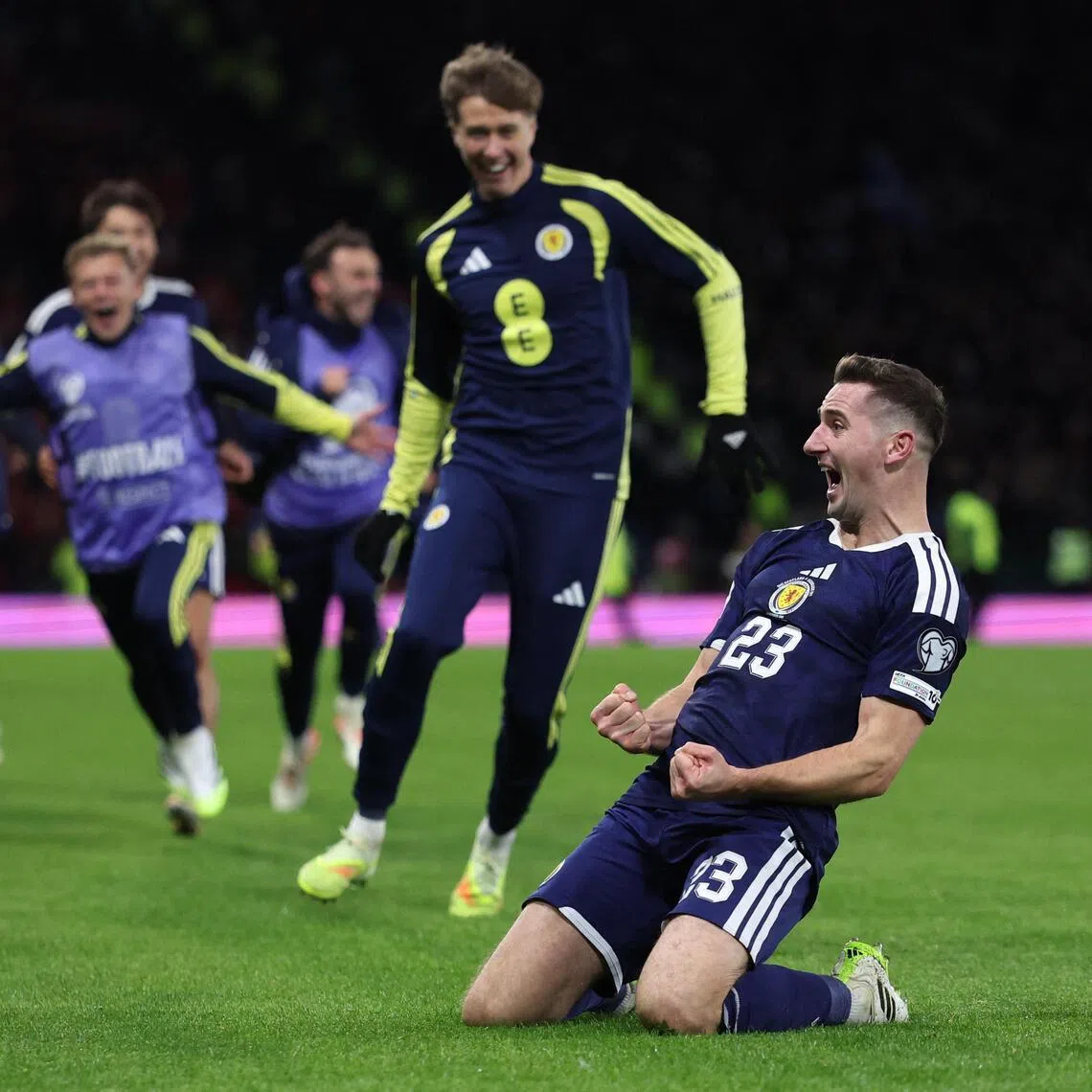 Scotland's Kenny McLean celebrates scoring their fourth goal in the 4-2 win over Denmark at Hampden Park, Glasgow in their   World Cup qualifier on Nov 18, 2025.