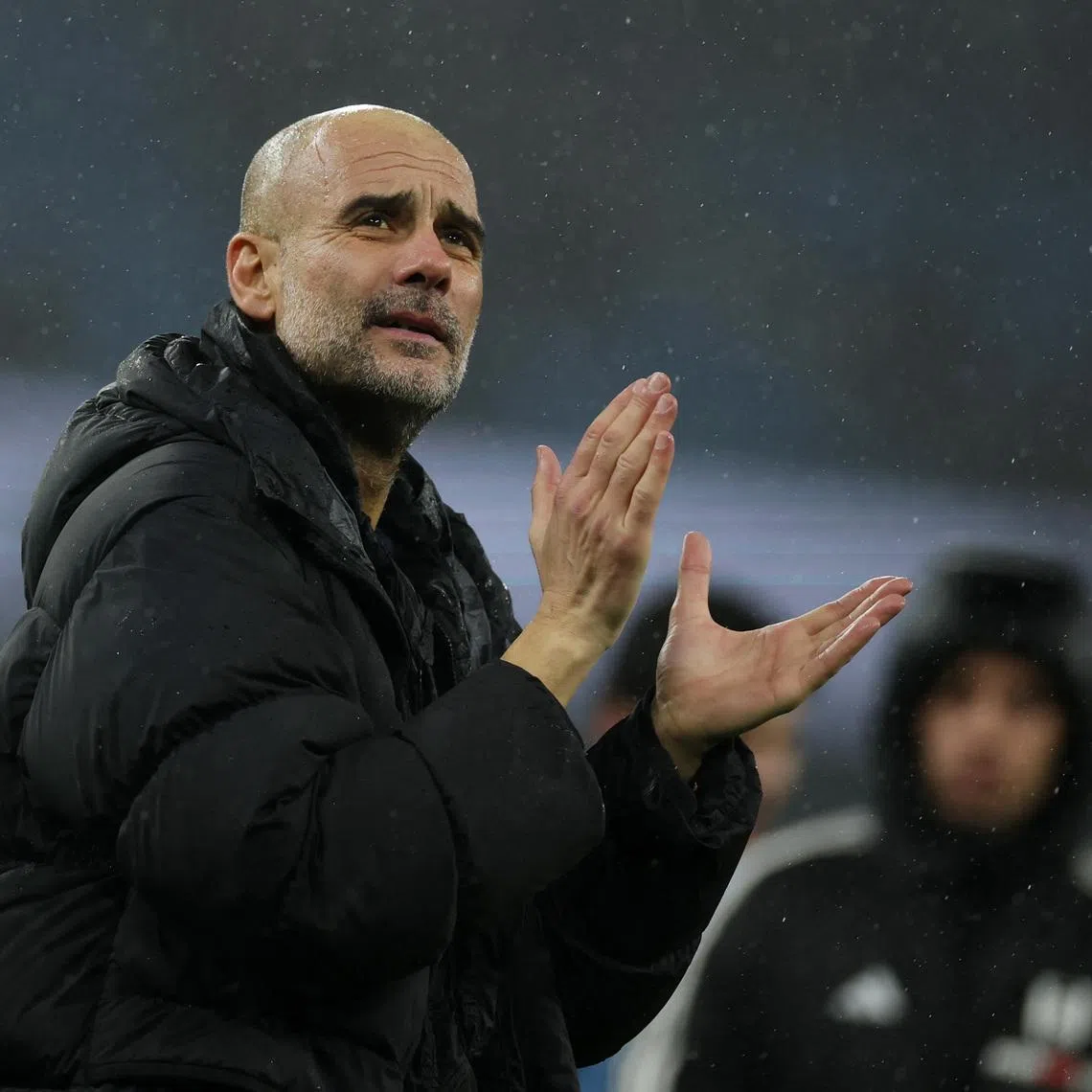 Soccer Football - Premier League - Manchester City v Fulham - Etihad Stadium, Manchester, Britain - February 11, 2026 Manchester City manager Pep Guardiola applauds fans after the match REUTERS/Phil Noble