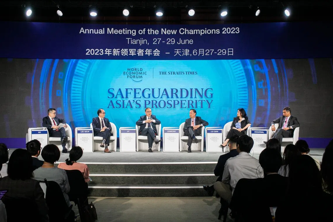 (From left) ST editor Jaime Ho, Seoul National University Professor of International Relations Lee Geun, Philippine Secretary of Information and Communications Technology Ivan John E. Uy, Consilience director Thomas Trikasih Lembong, Economist Group's managing director of Greater China Liu Qian and Boston Consulting Group Asia-Pacific regional chair Neeraj Aggarwal.