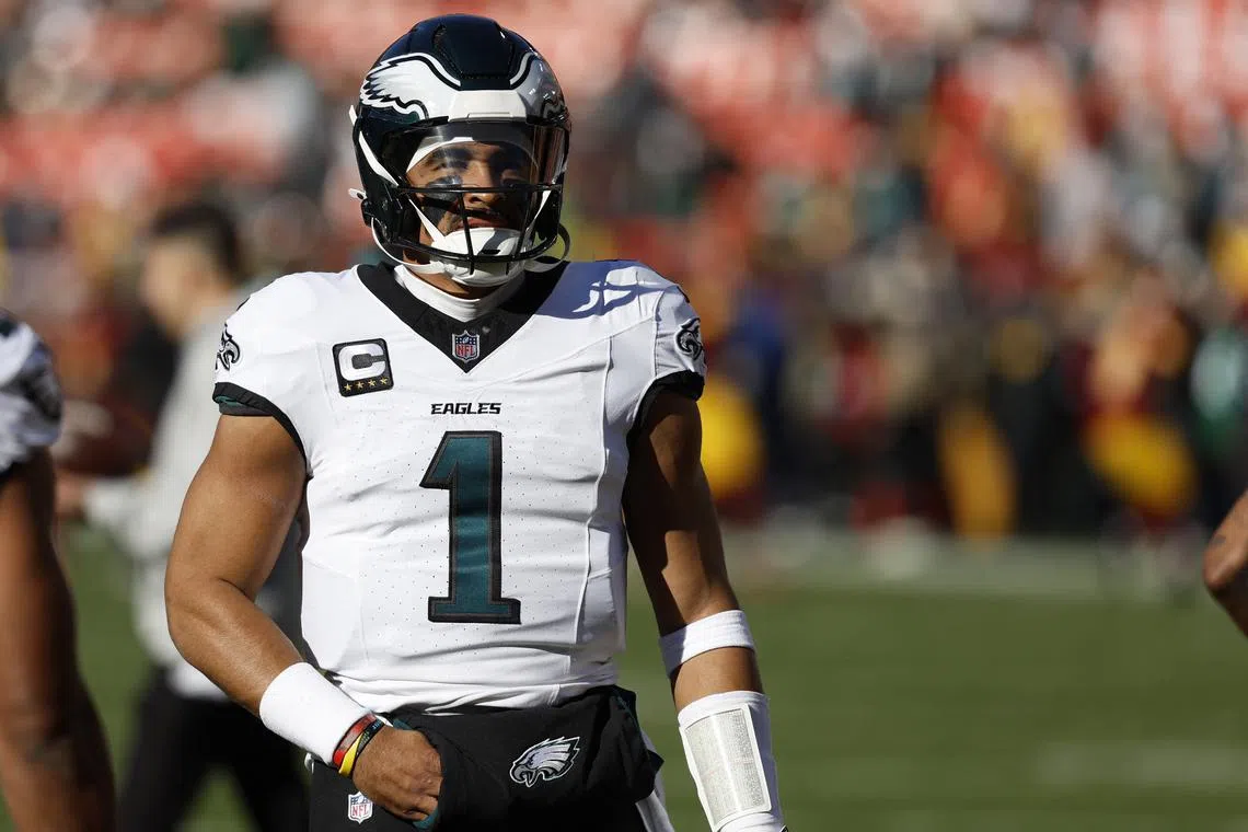 FILE PHOTO: Dec 22, 2024; Landover, Maryland, USA; Philadelphia Eagles quarterback Jalen Hurts (1) stands on the field during warmup prior to the game against the Washington Commanders at Northwest Stadium. Mandatory Credit: Geoff Burke-Imagn Images/File Photo