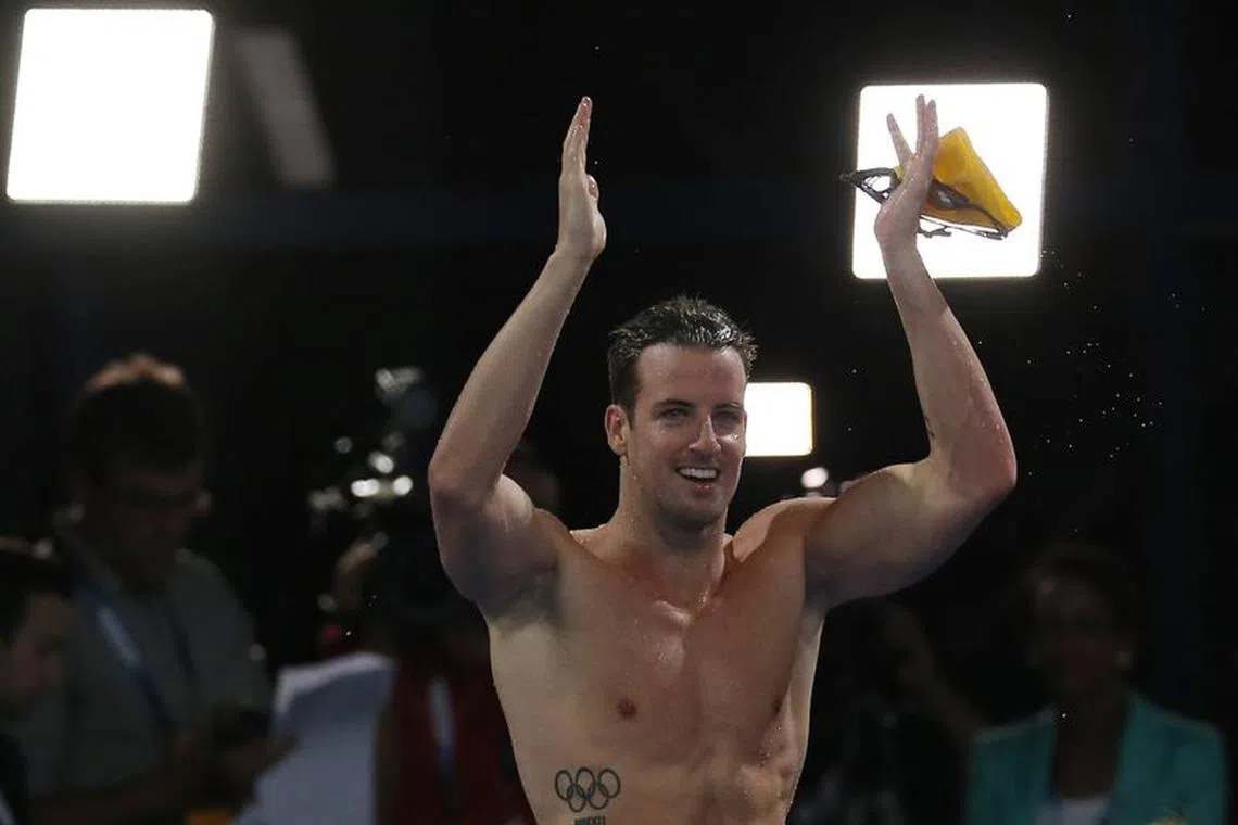 Australia's James Magnussen celebrates winning the gold medal in men's 100m Freestyle final at the 2014 Commonwealth Games in Glasgow, Scotland, July 27, 2014. REUTERS/Jim Young/File Photo