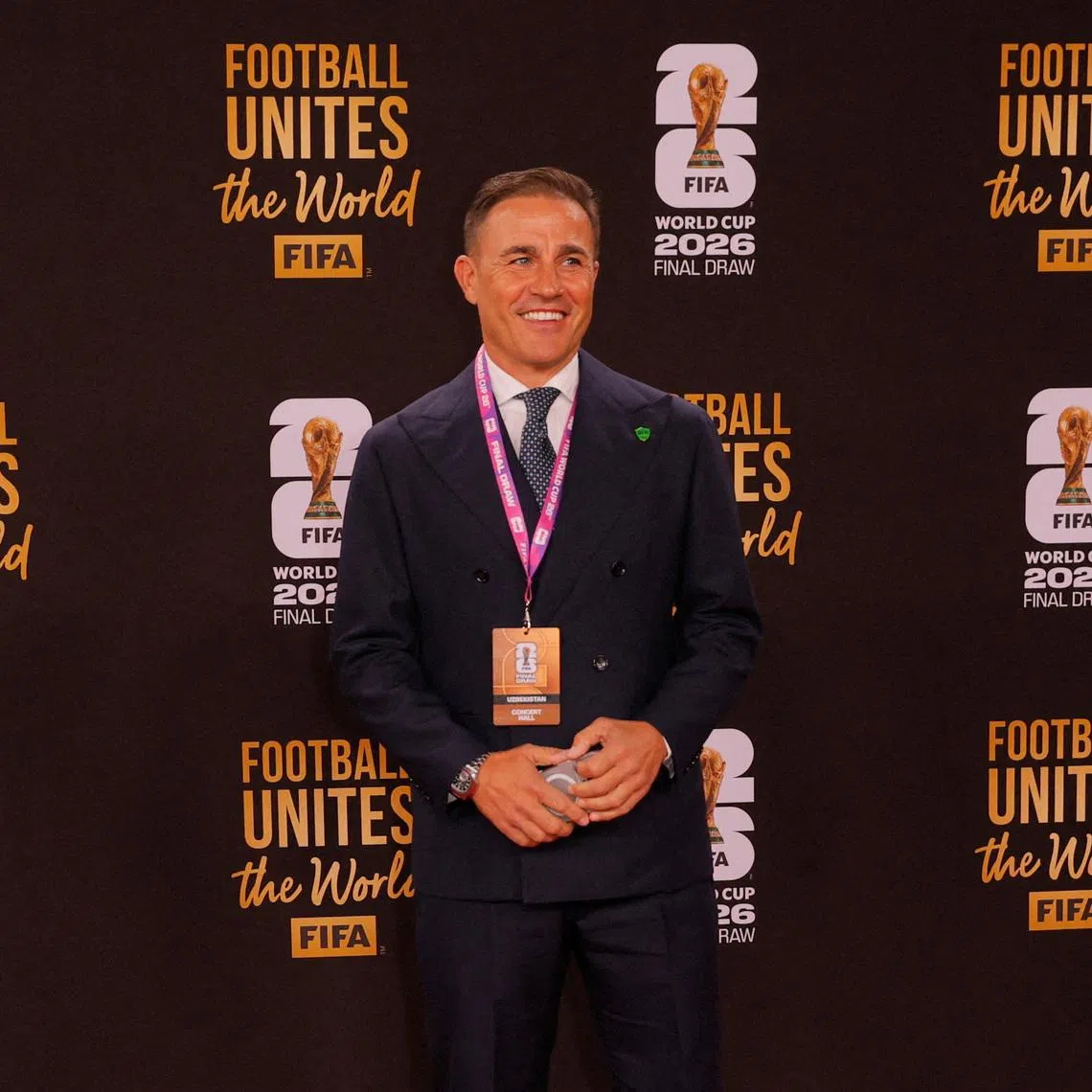 FILE PHOTO: Soccer Football - FIFA World Cup 2026 - FIFA World Cup 2026 Draw - John F. Kennedy Center for the Performing Arts, Washington, D.C., U.S. - December 5, 2025 Uzbekistan coach Fabio Cannavaro arrives on the red carpet ahead of the FIFA World Cup 2026 Draw REUTERS/Brian Snyder/File Photo