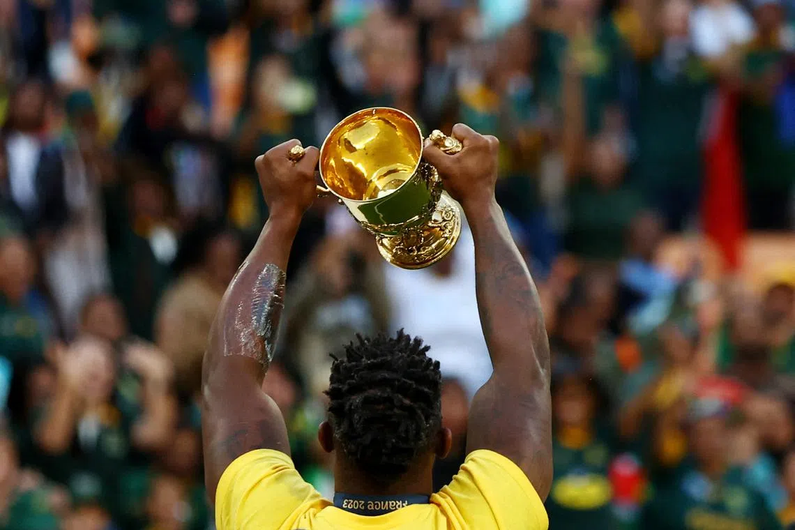 FILE PHOTO: Rugby Union - Rugby World Cup 2023 - South Africa Trophy Tour - FNB Stadium, Johannesburg, South Africa - November 2, 2023 South Africa's Siya Kolisi celebrates winning the World Cup during the trophy tour REUTERS/Siphiwe Sibeko/File Photo