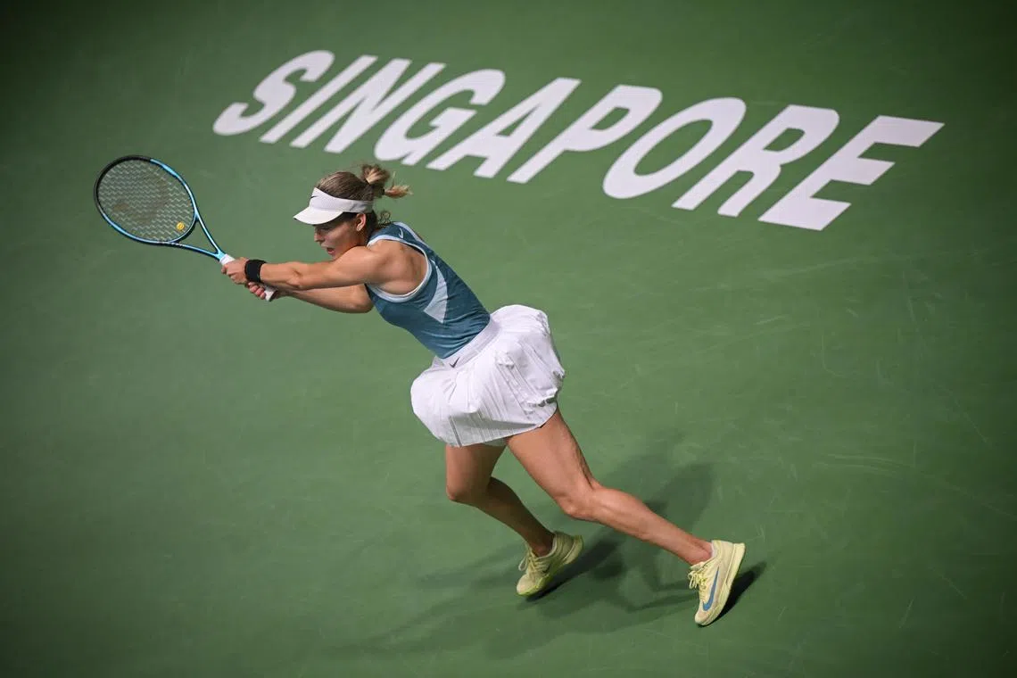 Anna Kalinskaya in action against Mananchaya Sawangkaew of Thailand during the quarter finals of Singapore Tennis Open.