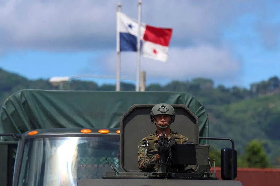 A member of the Panamanian security forces attends the launching ceremony of operation Choco at Nicanor Air Base, after the Panamanian government deployed on Friday at its border with Colombia to fight organized crime and human smuggling linked to the growing flow of migrants crossing the dangerous jungle of the Darien Gap, Panama June 2, 2023. REUTERS/Aris Martinez/File photo