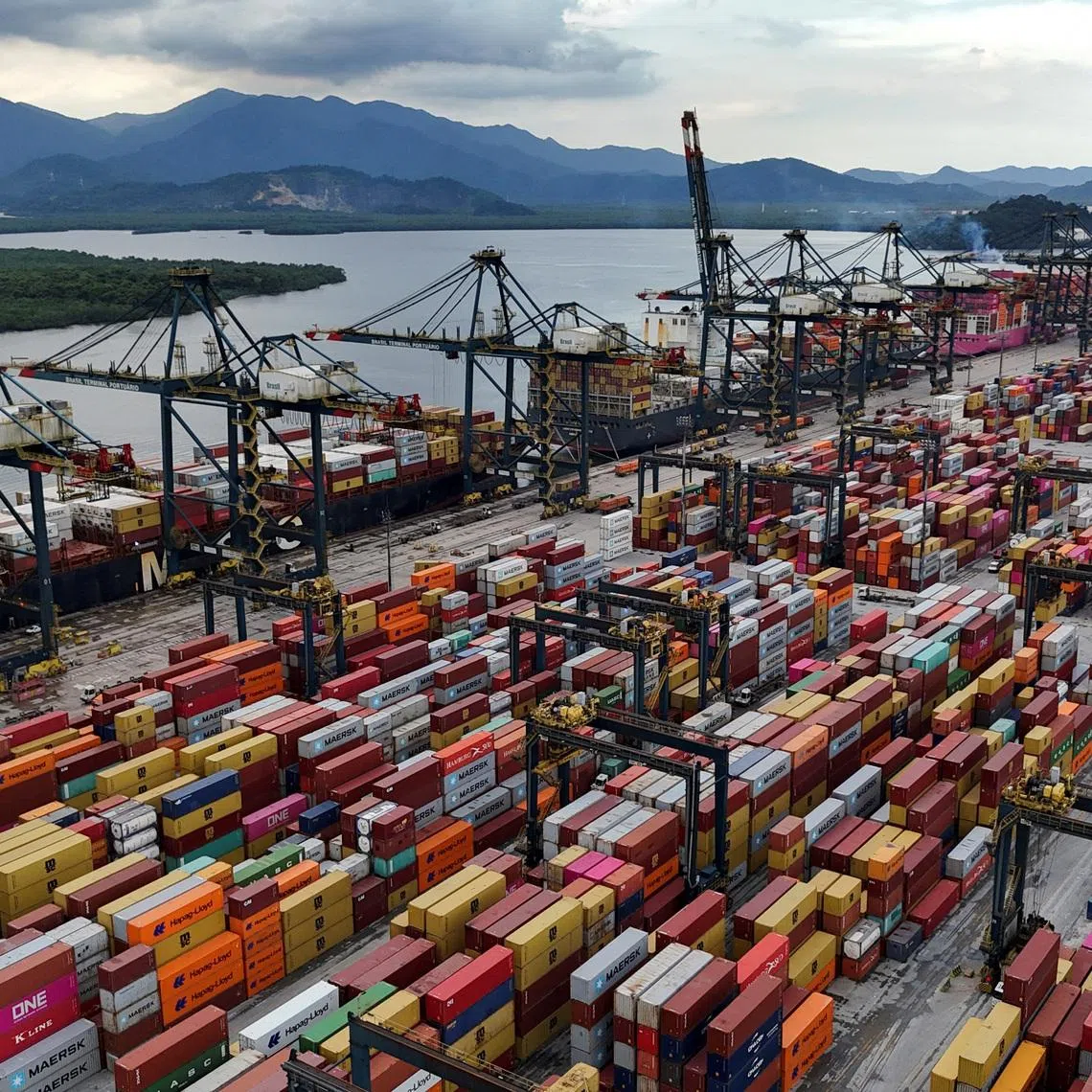 A drone view shows ships and containers at the Port of Santos, in Santos, Brazil April 3, 2025. REUTERS/Amanda Perobelli