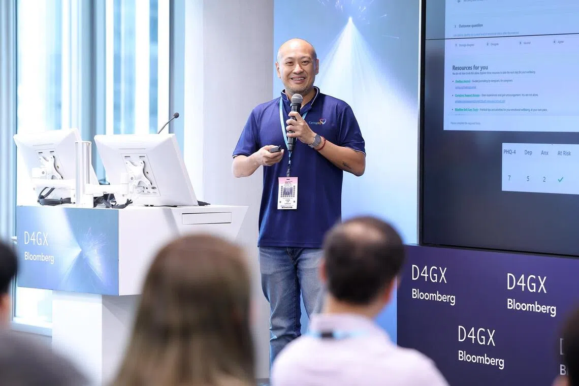 CaringSG’s IT manager Chris Lim at the Data for Good Exchange (D4GX) in 2025. The non-profit created a new platform which shows caregivers’ information at a glance.