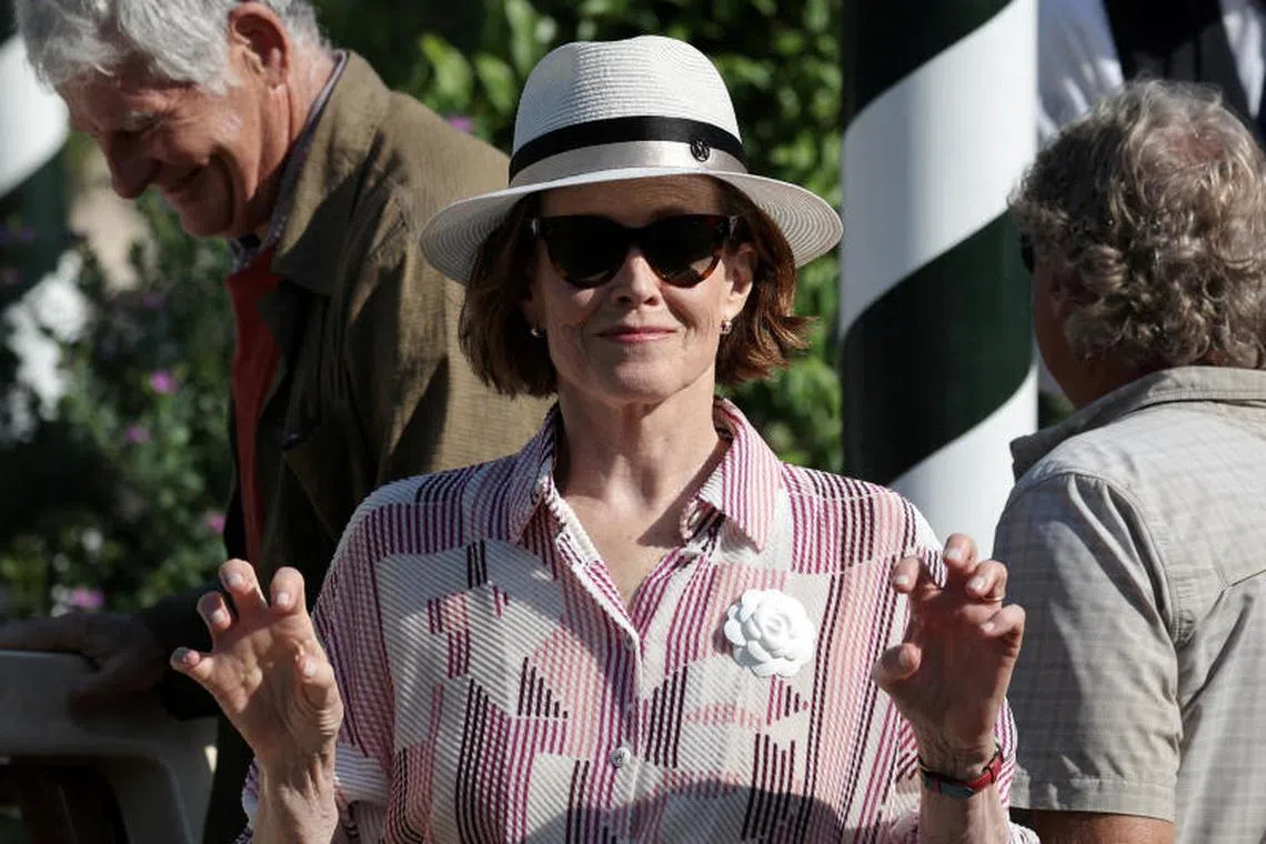 Sigourney Weaver gestures as she leaves the Excelsior hotel during the 81st Venice Film Festival in Italy on Aug 29, 2024. The actress recently made her West End debut in William Shakespeare’s The Tempest.