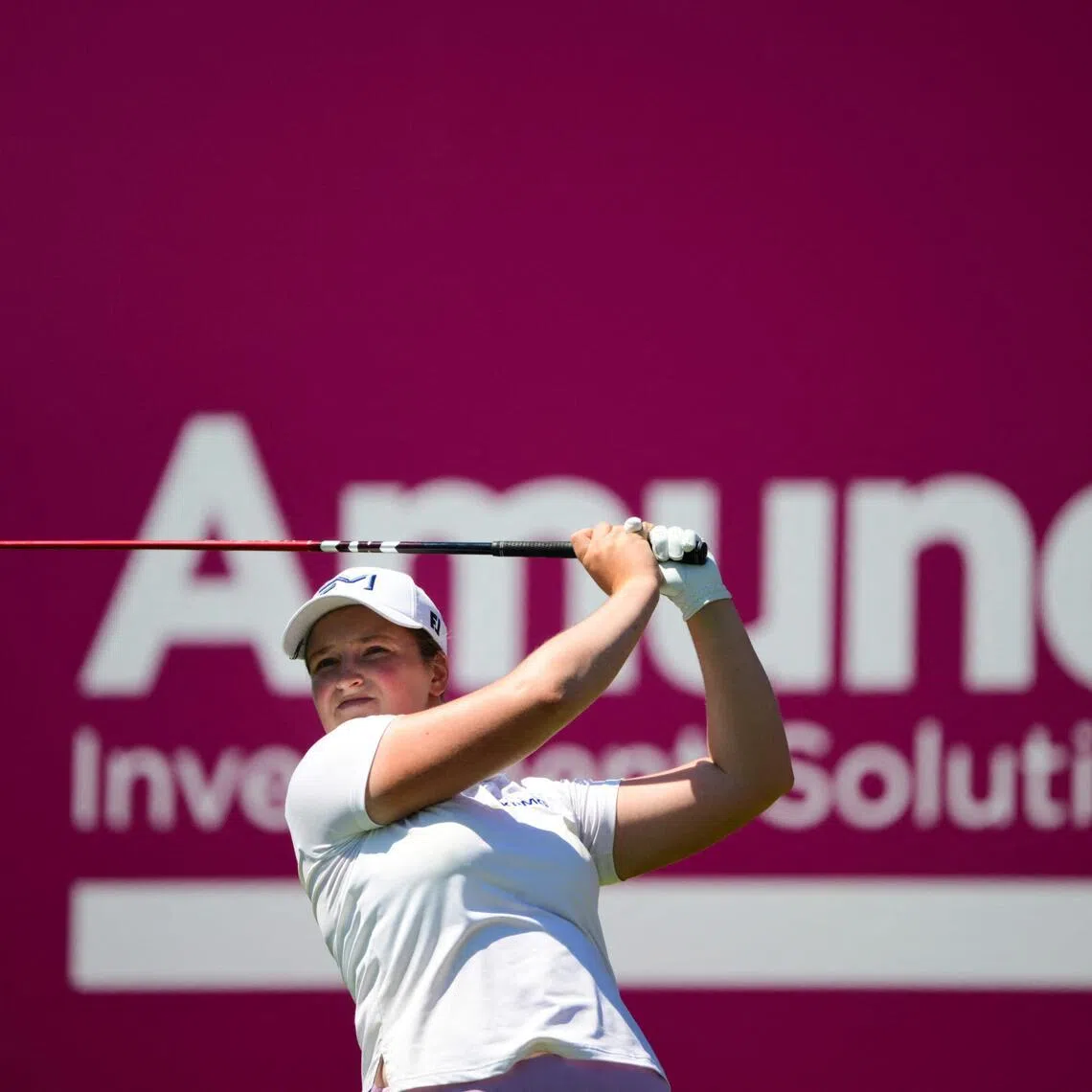Lottie Woad of England competes in the second round of the Amundi Evian Championship at Evian Resort Golf Club, in Evian-Les-Bains, center eastern France on July 9, 2026. (Photo by OLIVIER CHASSIGNOLE / AFP)