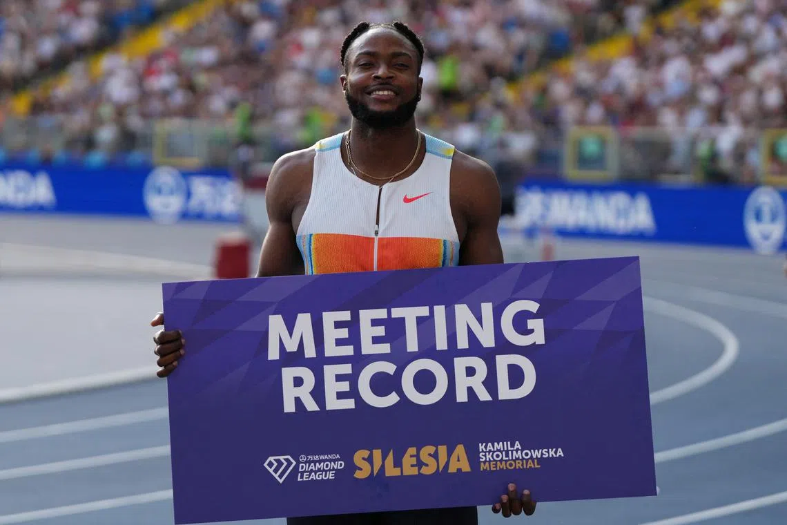 FILE PHOTO: Athletics - Diamond League - Silesia - Silesian Stadium, Chorzow, Poland - August 16, 2025 Jamaica's Kishane Thompson celebrates after setting a new Meeting Record to win the Men's 100m Final REUTERS/Aleksandra Szmigiel/File Photo