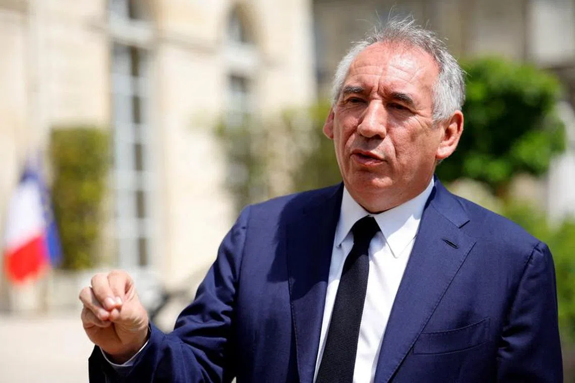 FILE PHOTO: Francois Bayrou, leader of French centrist party MoDem (Mouvement Democrate), talks to journalists after a meeting with the French President at the Elysee Palace in Paris, France, June 21, 2022. REUTERS/Sarah Meyssonnier/File Photo