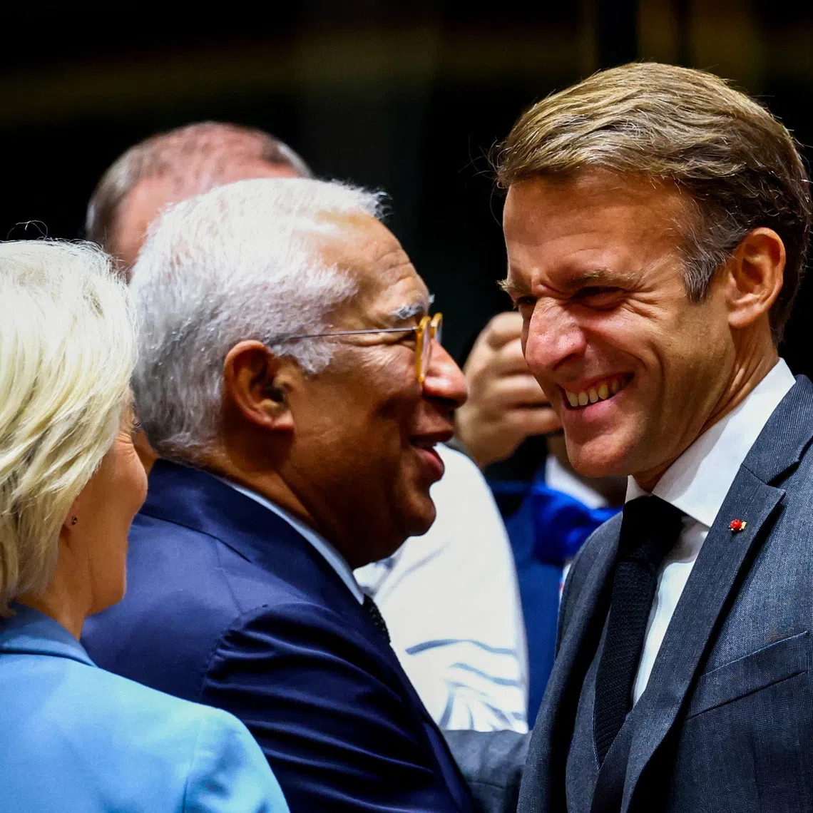 European Commission President Ursula von der Leyen, European Council President Antonio Costa and French President Emmanuel Macron react on the day of the European Union leaders' summit in Brussels, Belgium October 15, 2026. REUTERS/Yves Herman