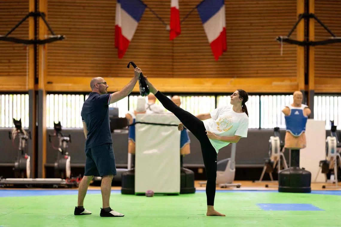 Afghan taekwondo athlete in the women's -57kg category and an IOC Refugee Athlete Scholarship-holder Marzieh Hamidi, taking part in a training session on June 29, 2023.