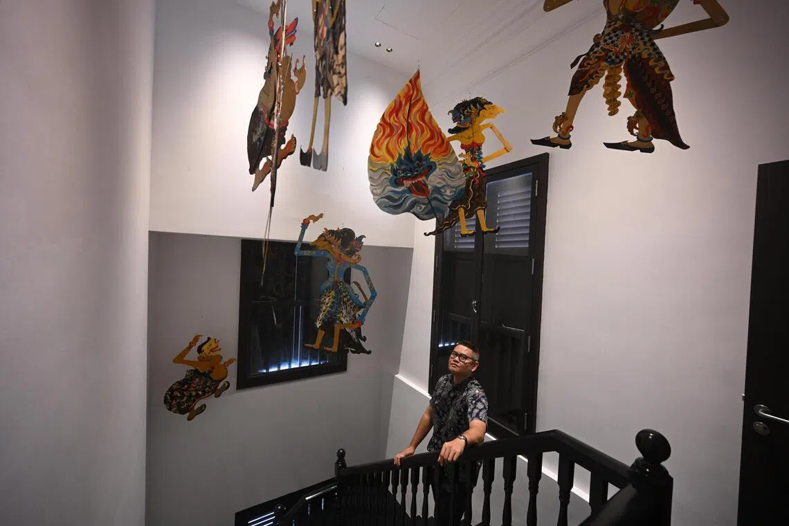 Malay Heritage Centre general manager Hafiz Shariff looking at the wayang kulit installation at the revamped centre on Feb 3.
