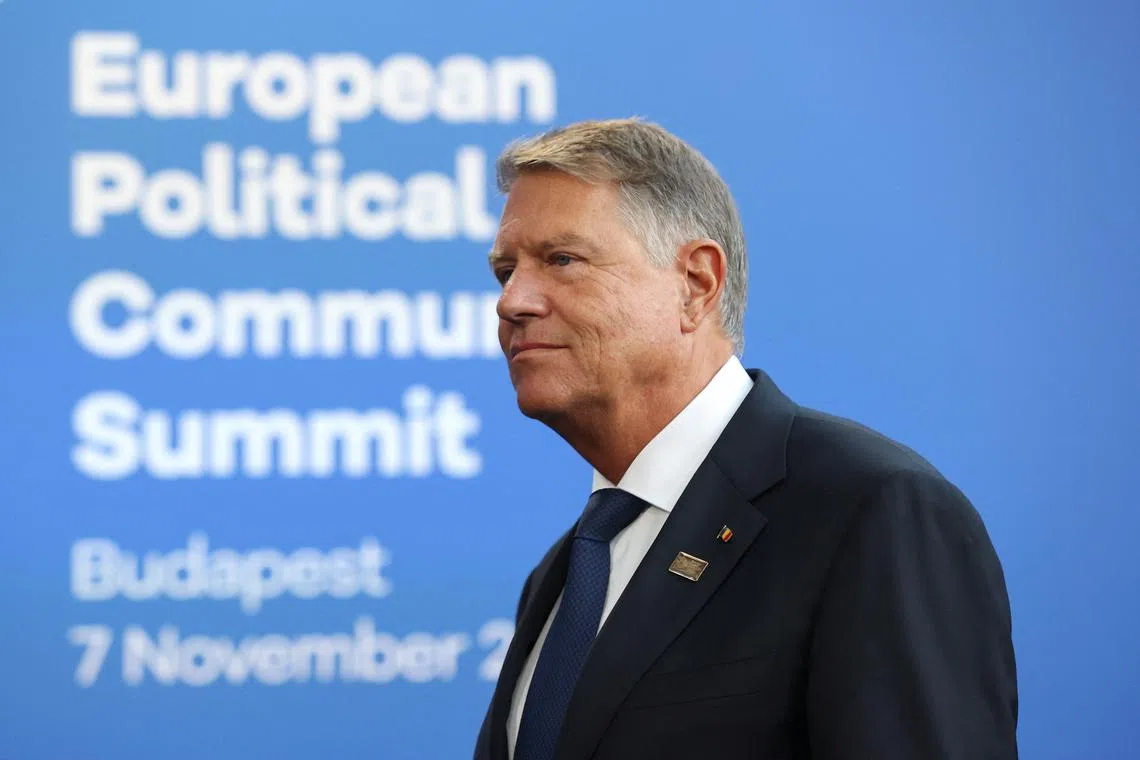 FILE PHOTO: Romanian President Klaus Iohannis attends the European Political Community Summit at the Puskas Arena, in Budapest, Hungary, November 7, 2024. REUTERS/Bernadett Szabo/File Photo