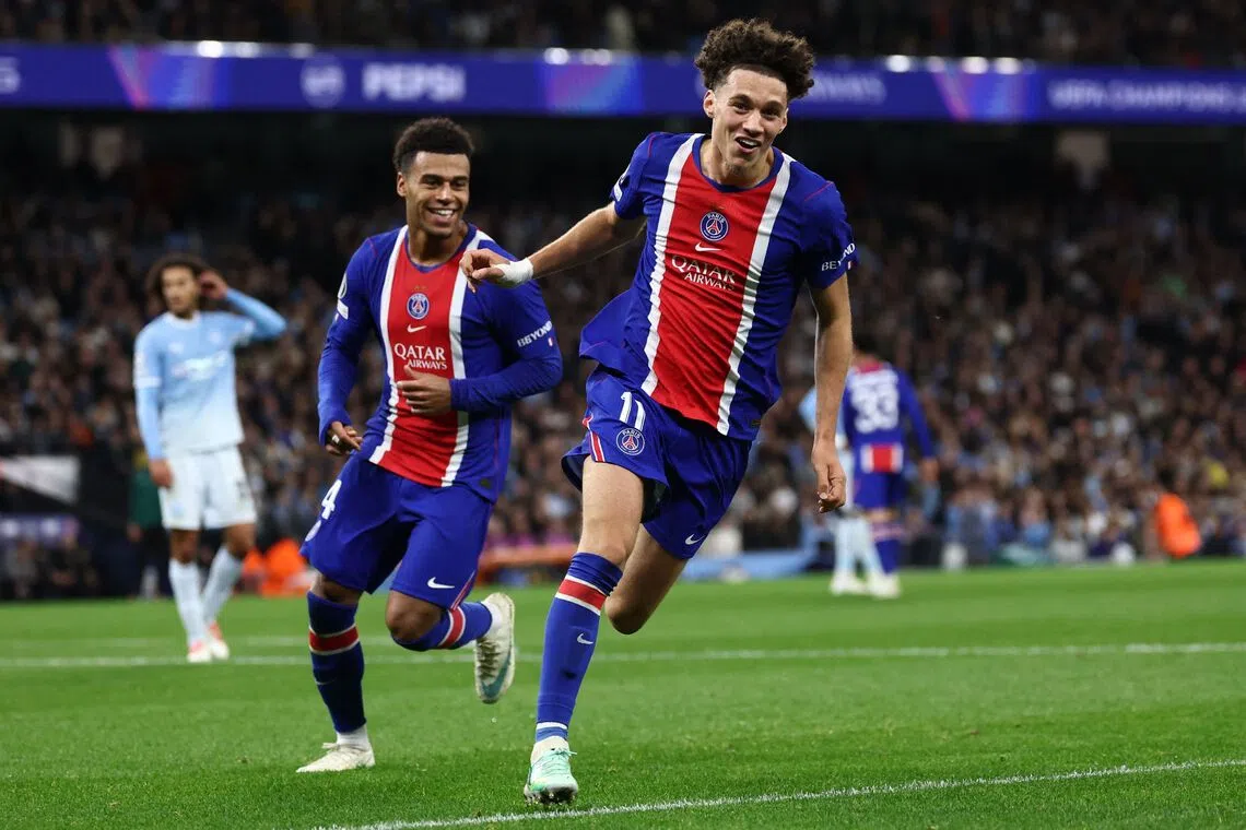 Paris Saint-Germain’s French midfielder Maghnes Akliouche celebrates after scoring their fourth goal against Manchester City at the UEFA Champions League match on Oct 14.