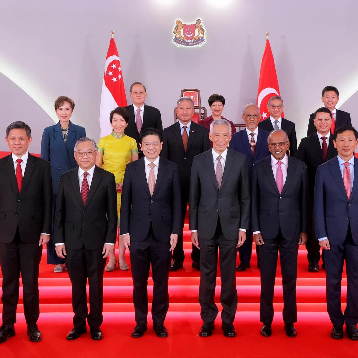 PM Lawrence Wong (front row, third from left) with his newly sworn-in Cabinet ministers at the Istana on May 23.