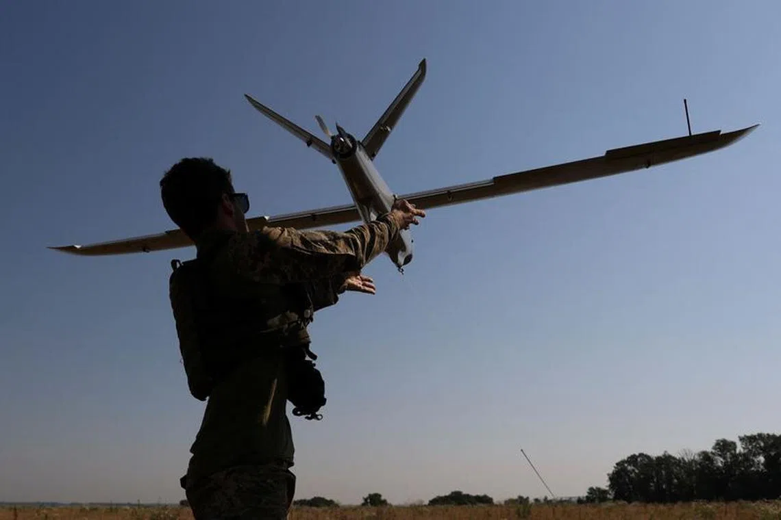 A Ukrainian serviceman launches a reconnaissance unmanned aerial vehicle near a frontline, amid Russia’s attack on Ukraine, in Donetsk region, Ukraine July 6, 2023. REUTERS/Sofiia Gatilova/File Photo