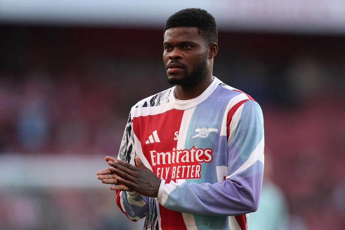 FILE PHOTO: Soccer Football - Premier League - Arsenal v Manchester City - Emirates Stadium, London, Britain - February 2, 2025 Arsenal's Thomas Partey during the warm-up before the match REUTERS/David Klein/File Photo