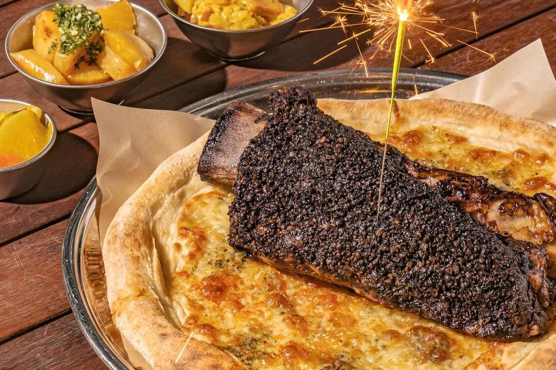 The Firehouse Dino Meat Pizza Pie.
