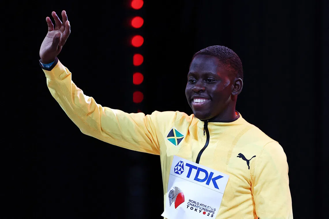 World Athletics Championships Tokyo 2025 - Men's 100m Medal Ceremony - Japan National Stadium, Tokyo, Japan - September 15, 2025 Gold medallist Jamaica's Oblique Seville celebrates on the podium REUTERS/Eloisa Lopez