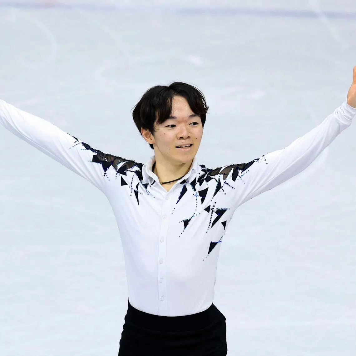Feb 10, 2026; Milan, Italy; Yuma Kagiyama of Japan competes in men's singles short program during the Milano Cortina 2026 Olympic Winter Games at Milano Ice Skating Arena. Mandatory Credit: Katie Stratman-Imagn Images