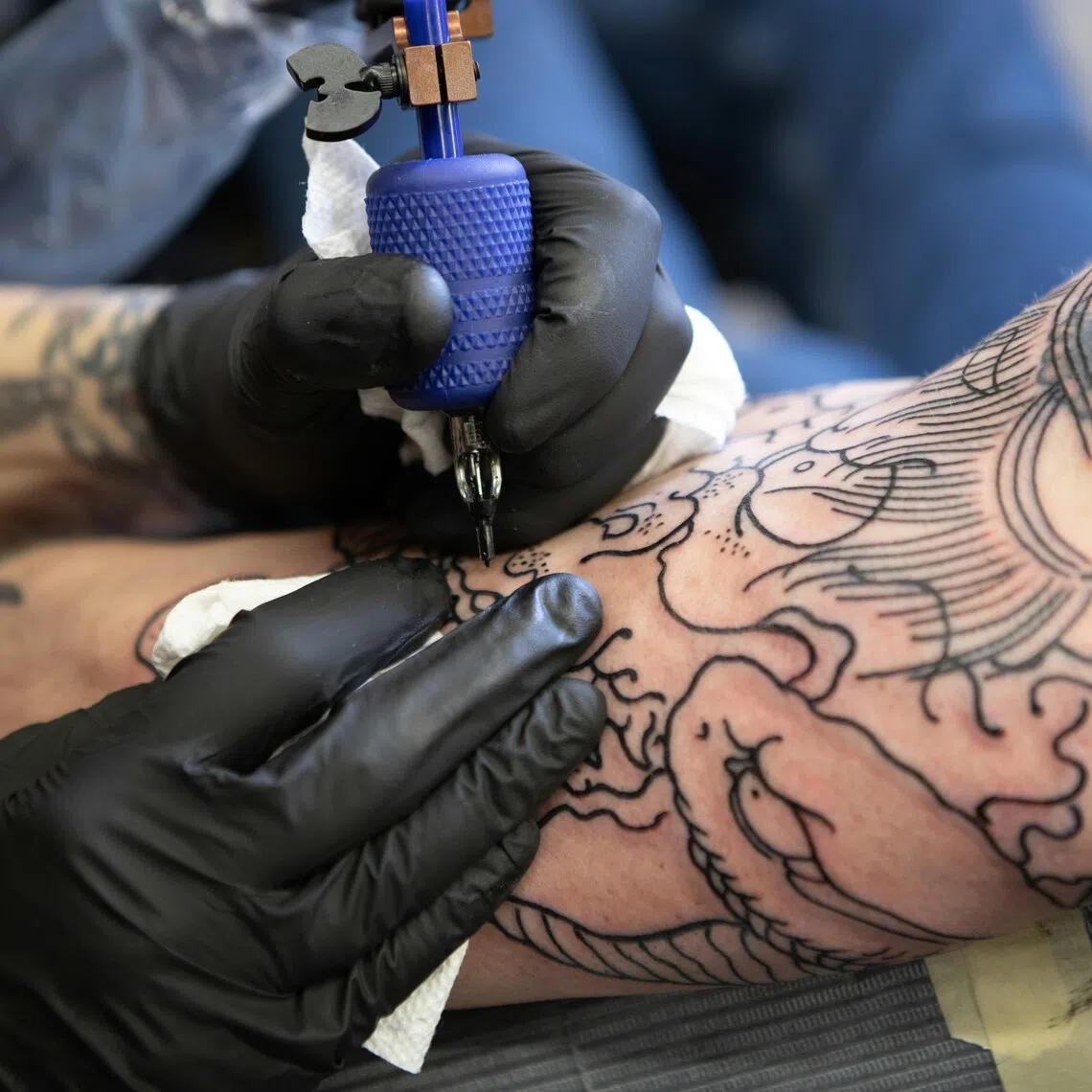 The study's authors say the results point to a need for tougher toxicology testing and stricter oversight of tattoo ink ingredients.