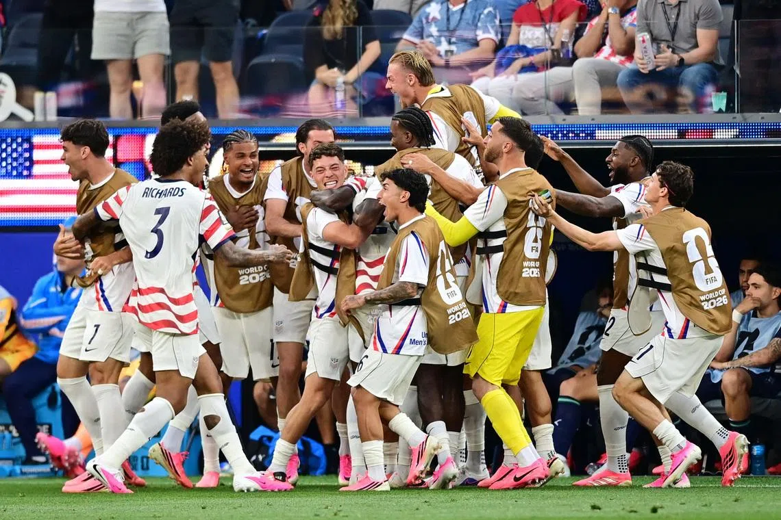 Soccer Football - FIFA World Cup 2026 - Group D - United States v Paraguay - Los Angeles Stadium, Inglewood, California, U.S. - June 12, 2026 Folarin Balogun of the U.S. celebrates scoring their second goal with teammates IMAGN IMAGES via Reuters/Gary Vasquez