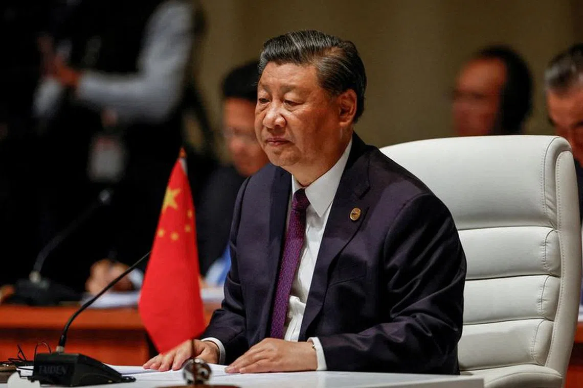 FILE PHOTO: Chinese President Xi Jinping attends the plenary session of the 2023 BRICS Summit at the Sandton Convention Centre in Johannesburg, South Africa on August 23, 2023. GIANLUIGI GUERCIA/Pool via REUTERS/File Photo