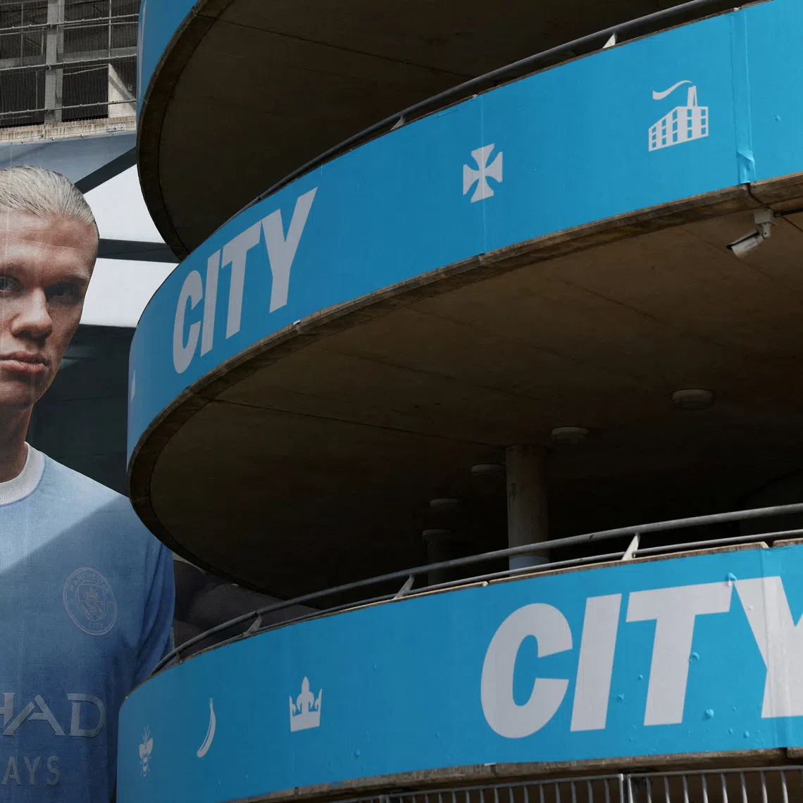 FILE PHOTO: Soccer Football - General view of the Etihad Stadium, home of Manchester City football club, following Manchester City being found guilty on all but one of 115 charges over breaches of Premier League financial rules, in Manchester, Britain, September 26, 2026 A poster of Manchester City's Erling Haaland outside the stadium Action Images via Reuters/Lee Smith/File Photo