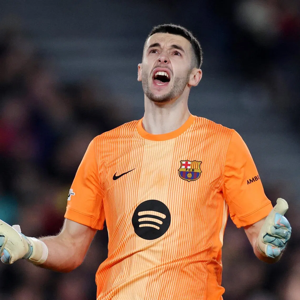 Soccer Football - UEFA Champions League - Round of 16 - Second Leg - FC Barcelona v Newcastle United - Spotify Camp Nou, Barcelona, Spain - March 18, 2026 FC Barcelona's Joan Garcia celebrates after making a save from Newcastle United's Anthony Gordon REUTERS/Nacho Doce