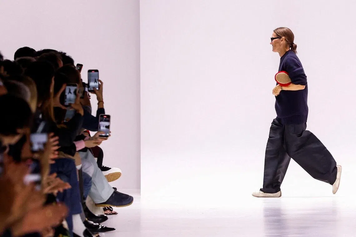 Designer Louise Trotter appears at the Bottega Veneta Spring/Summer 2026 collection show during Fashion Week in Milan, Italy, September 27, 2025. REUTERS/Alessandro Garofalo