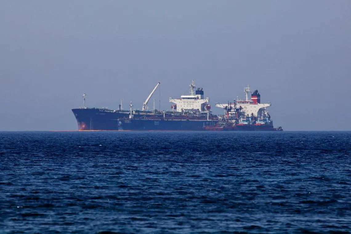 The Liberian-flagged oil tanker Ice Energy transfers crude oil from the Iranian-flagged oil tanker Lana (former Pegas), off the shore of Karystos, on the Island of Evia, Greece, May 26, 2022. REUTERS/Costas Baltas/File Photo