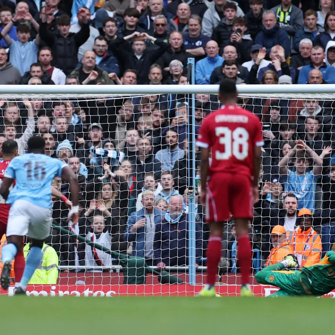 Soccer Football - FA Cup - Quarter Final - Manchester City v Liverpool - Etihad Stadium, Manchester, Britain - April 4, 2026 Manchester City's James Trafford saves a penalty taken by Liverpool's Mohamed Salah REUTERS/Phil Noble