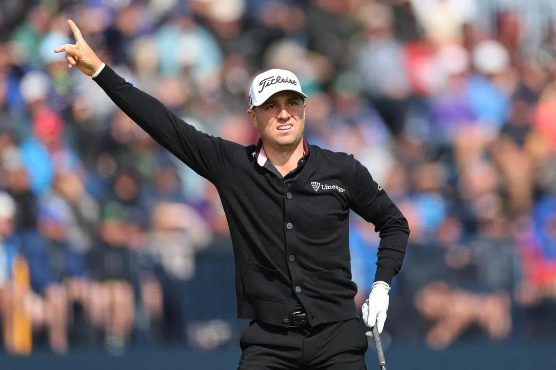 Justin Thomas gestures to the crowd after teeing off on the fouirth hole during the second round of The Open.
