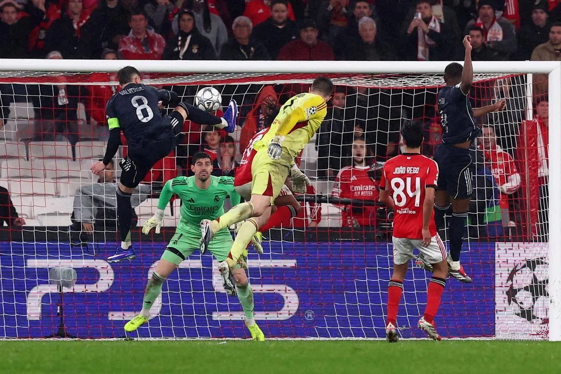 FILE PHOTO: Soccer Football - UEFA Champions League - Benfica v Real Madrid - Estadio da Luz, Lisbon, Portugal - January 28, 2026 Benfica's Anatoliy Trubin scores their fourth goal REUTERS/Pedro Nunes/File Photo