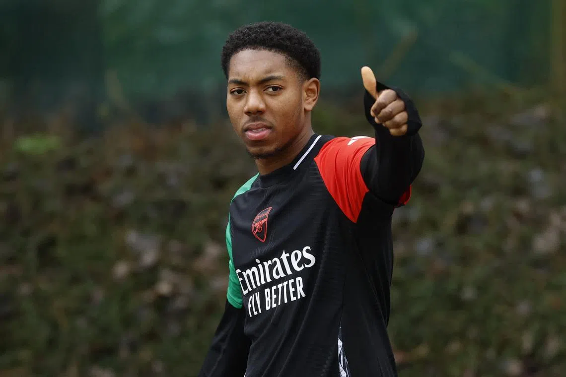 Soccer Football - Champions League - Arsenal Training - Arsenal Training Centre, London Colney, Britain - January 28, 2025 Arsenal's Myles Lewis-Skelly gestures during training Action Images via Reuters/Peter Cziborra