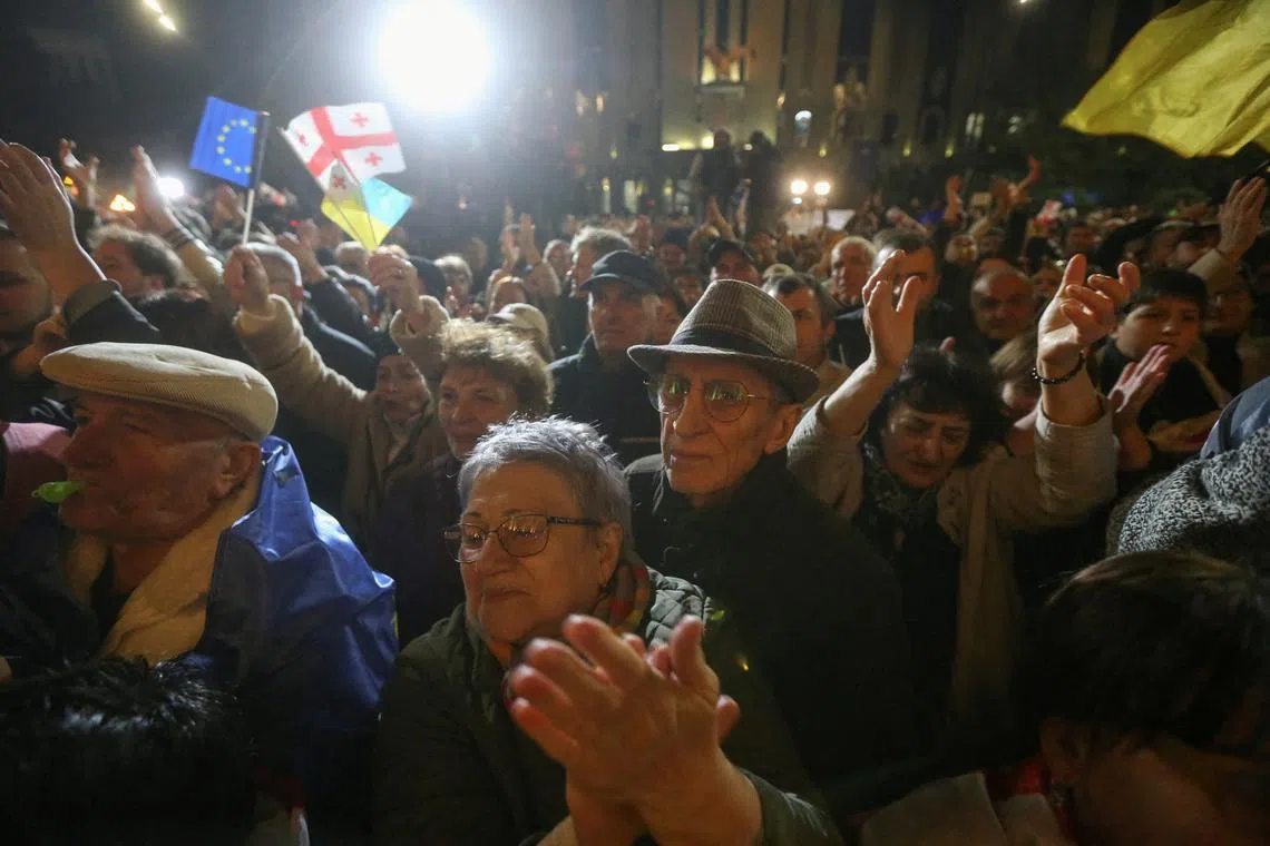 FILE PHOTO: Supporters of Georgia's opposition parties hold a rally to protest and dispute the result of a recent parliamentary election won by the ruling Georgian Dream party, in Tbilisi, Georgia October 28, 2024. REUTERS/Irakli Gedenidze/File Photo