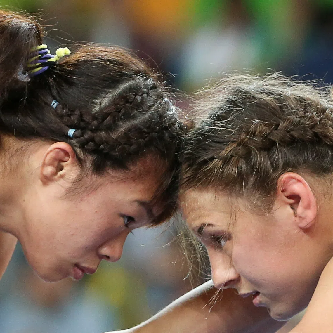 FILE PHOTO: 2016 Rio Olympics - Wrestling - Final - Women's Freestyle 63 kg Gold Medal - Carioca Arena 2 - Rio de Janeiro, Brazil - 18/08/2016. Maria Mamashuk (BLR) of Belarus and Risako Kawai (JPN) of Japan compete. REUTERS/Toru Hanai/File Photo