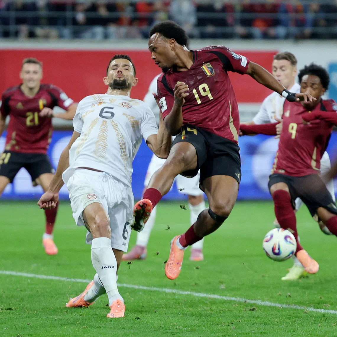 Soccer Football - FIFA World Cup - UEFA Qualifiers - Group J - Belgium v North Macedonia - KAA Gent Stadium, Ghent, Belgium - October 10, 2025 Belgium's Lois Openda in action with North Macedonia's Visar Musliu REUTERS/Yves Herman