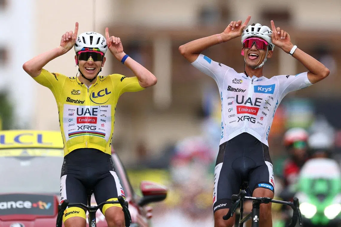 UAE Team Emirates-XRG’s Tadej Pogacar (left) and Isaac Del Toro (right) reacting at the end of stage 20.
