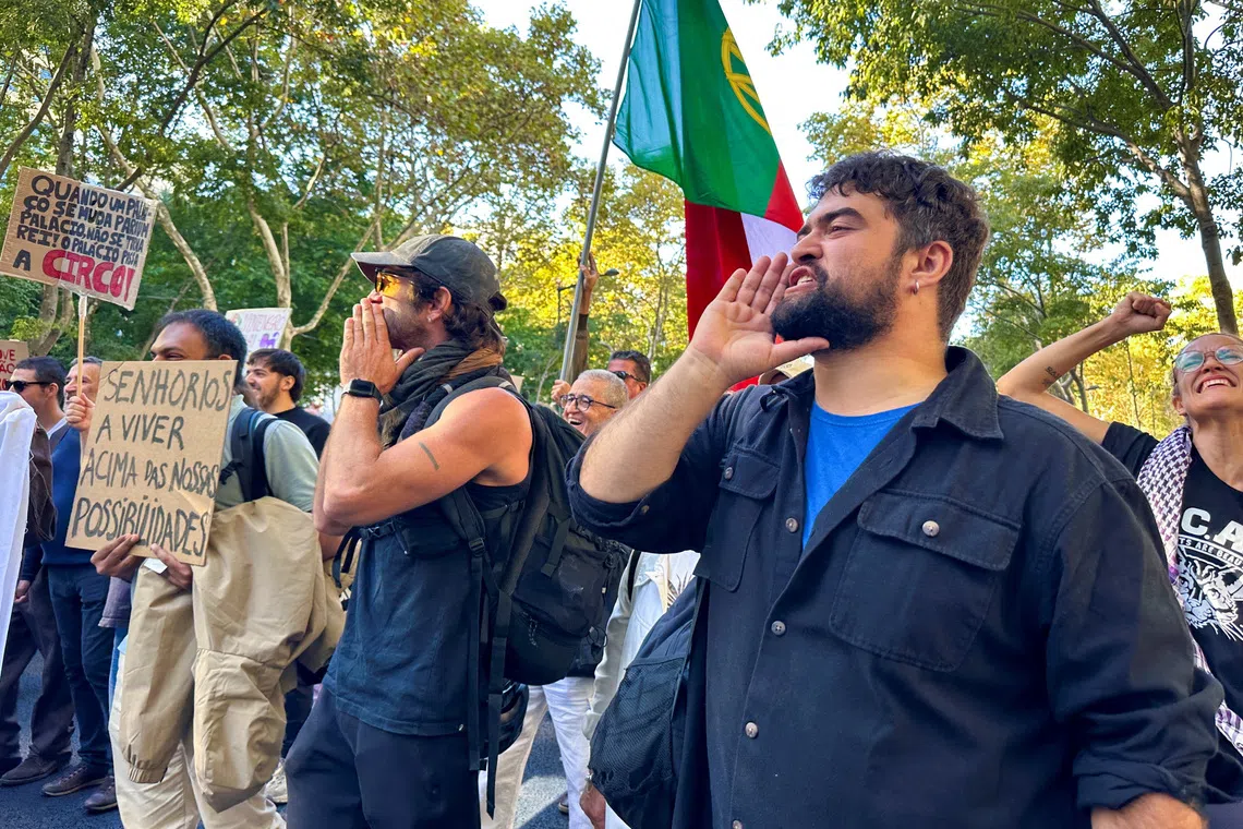 Housing activists marched to protest against Portugal’s worsening housing crisis, amid growing concerns over rising rents, house prices and a shortage of affordable homes in Lisbon on Oct 24.
