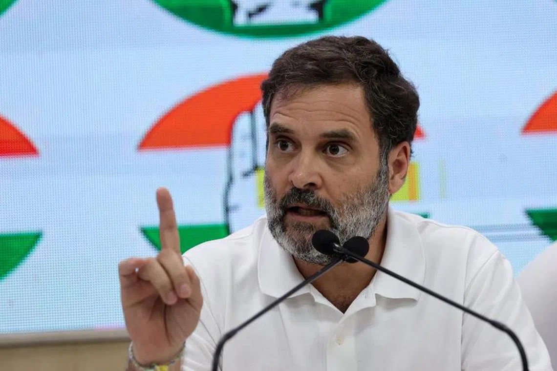 Rahul Gandhi, a senior leader of India's main opposition Congress party, gestures as he addresses the media at Congress' headquarters in New Delhi, India, October 9, 2023. REUTERS/Anushree Fadnavis/File Photo