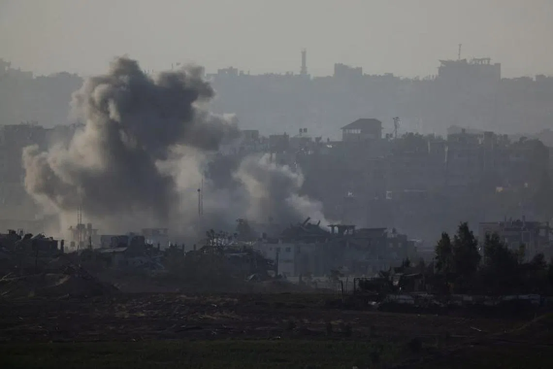 Smoke rises after an Israeli air strike in north Gaza, as seen from southern Israel, amid the ongoing conflict between Israel and the Palestinian group Hamas, November 23, 2023. REUTERS/Alexander Ermochenko