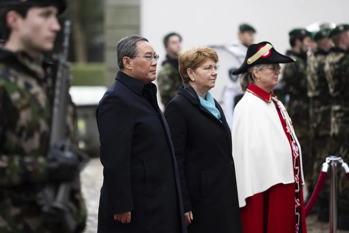Swiss President Viola Amherd (centre) welcoming Chinese Premier Li Qiang (left) in Kehrsatz, Switzerland, on Jan 15.