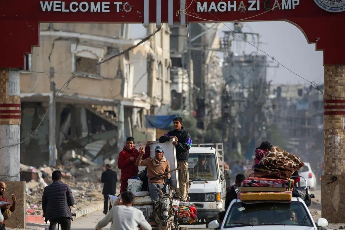 Palestinians flee Al-Maghazi refugee camp in central Gaza following Israeli evacuation orders on Dec 11, 2024.