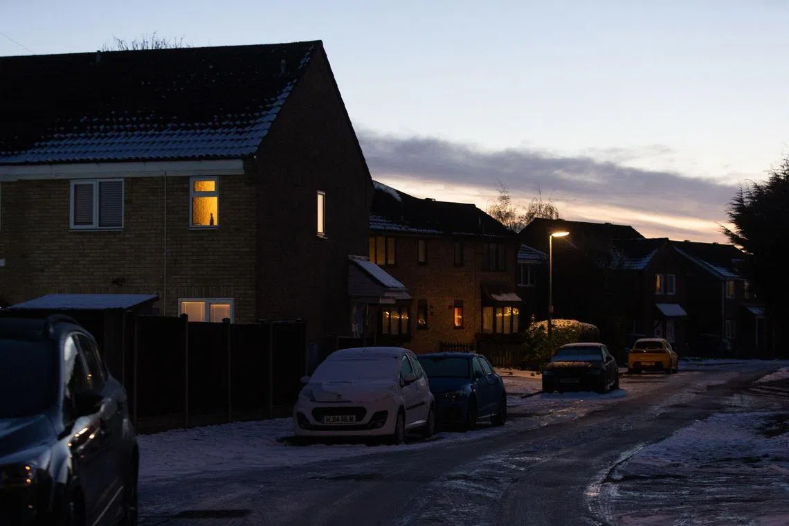 Lit rooms inside residential homes in St Neots, UK, on Wednesday, Dec. 14, 2022. UK power prices for Monday jumped to record levels as freezing temperatures are set to cause a surge in demand, just as a drop in wind generation causes a supply crunch. Photographer: Chris Ratcliffe/Bloomberg