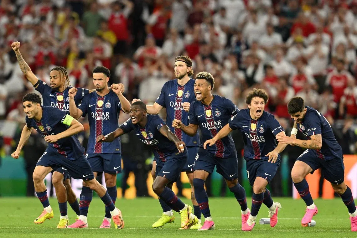 Soccer Football - UEFA Champions League - Final - Paris St Germain v Arsenal - Puskas Arena, Budapest, Hungary - May 30, 2026 Paris St Germain players celebrate after winning the UEFA Champions League REUTERS/Angelika Warmuth