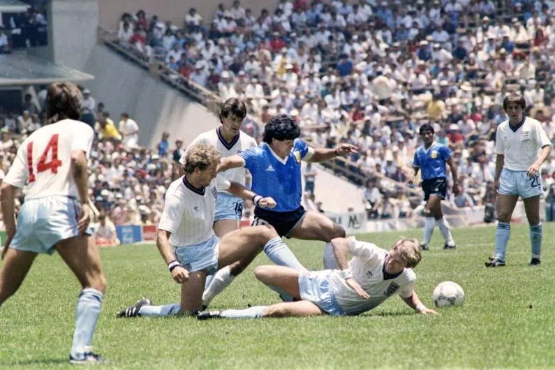 The World Cup offers mesmerising moments such as Argentinian midfielder Diego Maradona (centre) dribbling past three English defenders during the 1986 match in Mexico City.